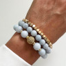 Blaues Set aus Armbändern mit Gold D4631